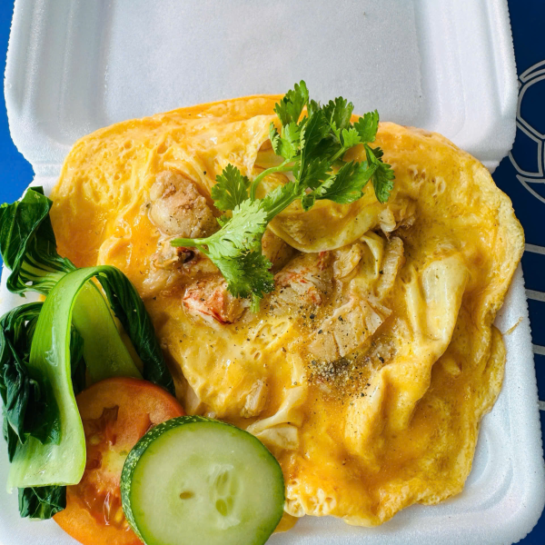 Cơm ghẹ phủ trứng